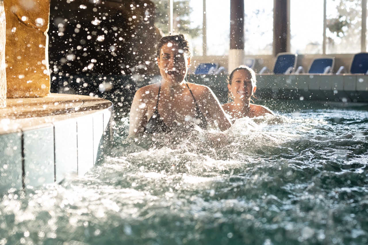 Wildwater drifting channel with water jets, water curtain, and cave.